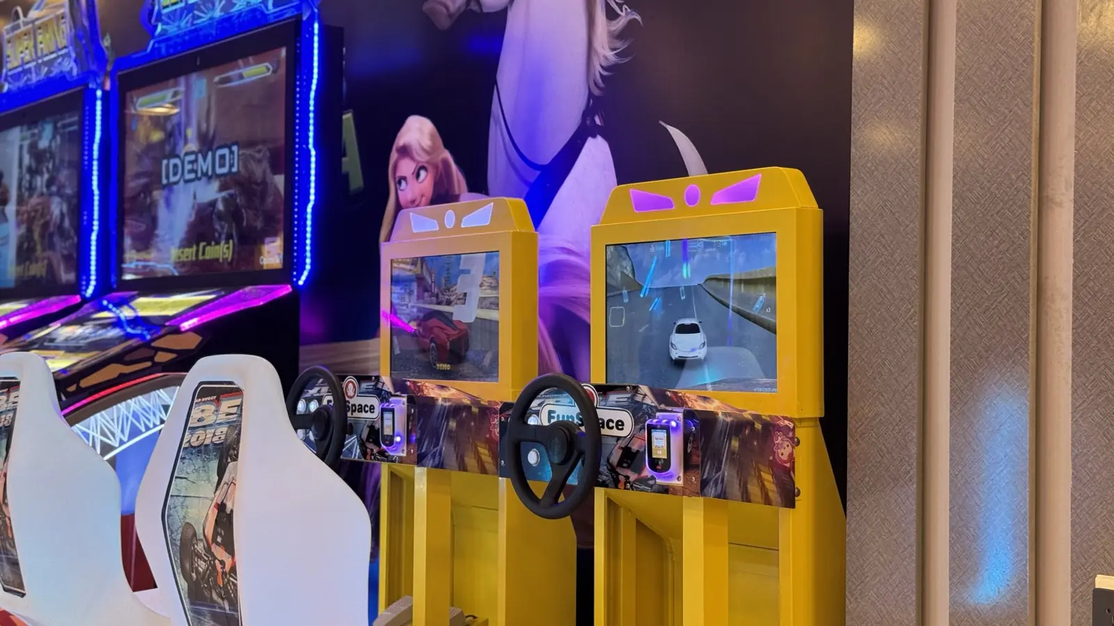 Redemption arcade game with steering wheel