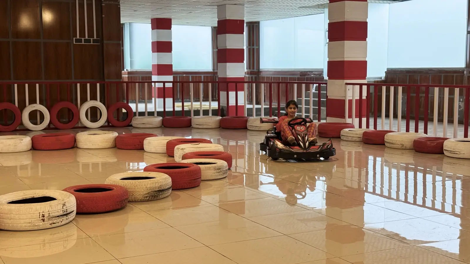 Child driving a go-kart at Funzania