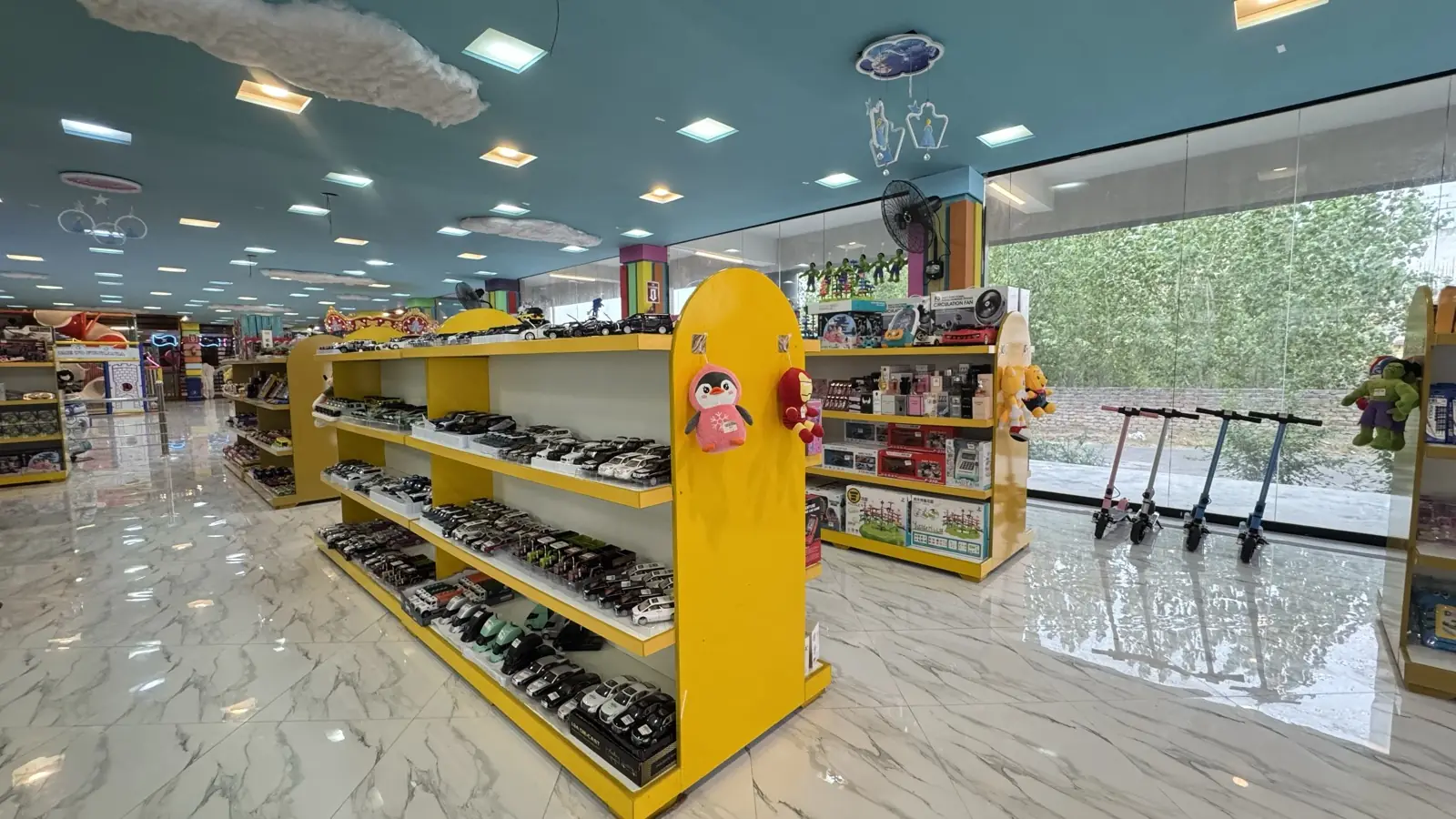Bright toy store aisle at Funzania